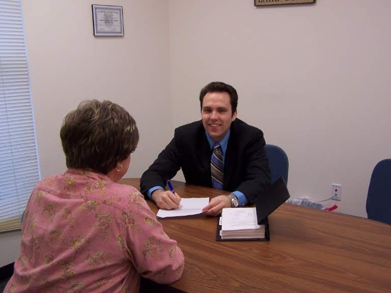 Ryan Michael Kelly meeting with community members during his public service.