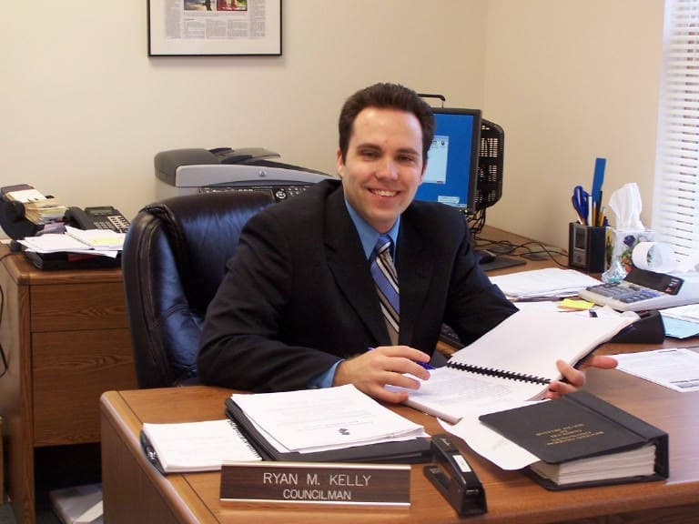 Ryan Michael Kelly at a council desk during his early local-government service.